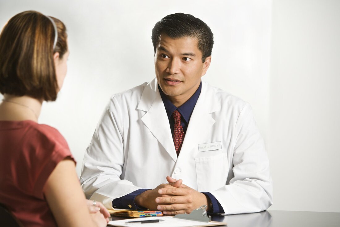 woman talking to the doctor